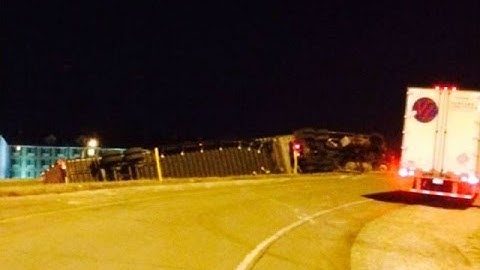 RAW VIDEO: Semi overturns on I-465 ramp near Kentucky Ave. on city