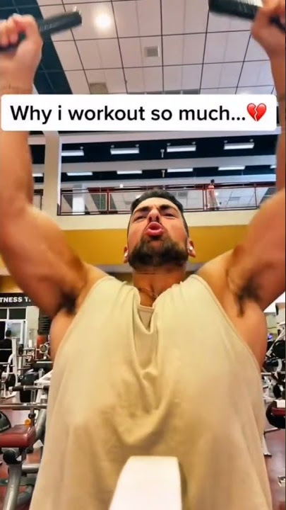 sweaty hairy armpits of bodybuilder during workout