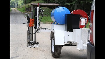 Core Cutting concrete sidewalk with Eze-Core Articulated arm - Reese hitch Mounted by