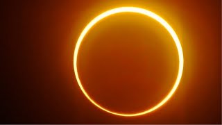 欠けた太陽が地平線に、北半球で部分日食を観測　一部地域では金環日食も
