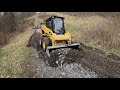 No Mini Excavator ; Skid steer CAT 242b instead ( driveway repair )