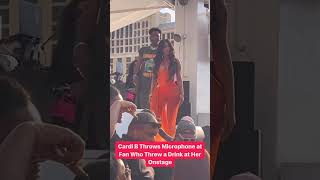 Cardi B Throws a microphone at a fan who threw a drink at her #shorts #cardib