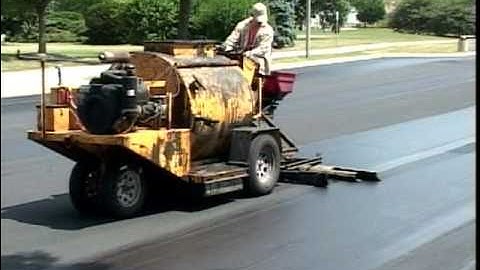 SealMaster Sealcoating: Liquid Road Asphalt Pavement Sealer on Parking Lot
