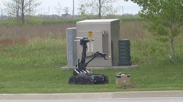 Police Robot and Remote Helicopter Remove Bomb
