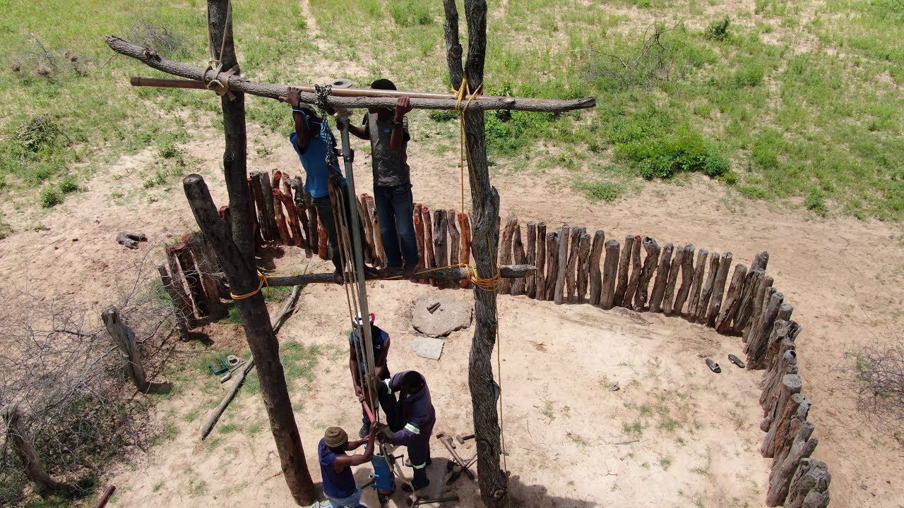 The community and Will's Wells working together to bring water to their village
