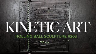 Rolling Ball Sculpture - wall mounted cn:203