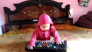 Baby Ayana playing Piano World class performance by 4 month old daughter