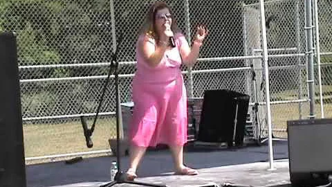 Crystal Barnes singing at the Scarborough Village ...