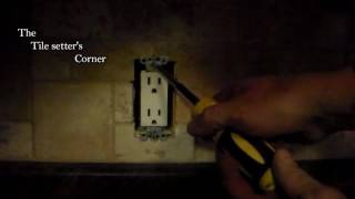 Tips on tiling around a kitchen backsplash outlet
