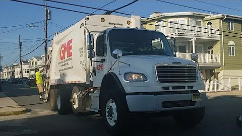 Gold Medal Environmental Frightliner M2 McNeilus rear loader garbage truck