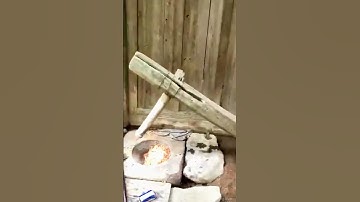 Traditional method of crushing chili peppers sharing