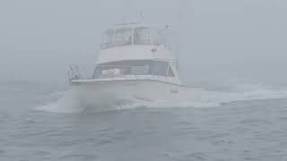 First Look Yacht Breaks Through The Thick Fog  - Shark River Inlet  - Belmar New Jersey