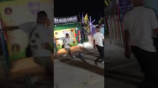 Guy Kicking Soccer Ball at Carnival Game Misses the Mark || ViralHog