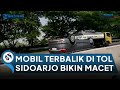 LAKA Mobil Terbalik di Tol Sidoarjo Bikin Macet Parah