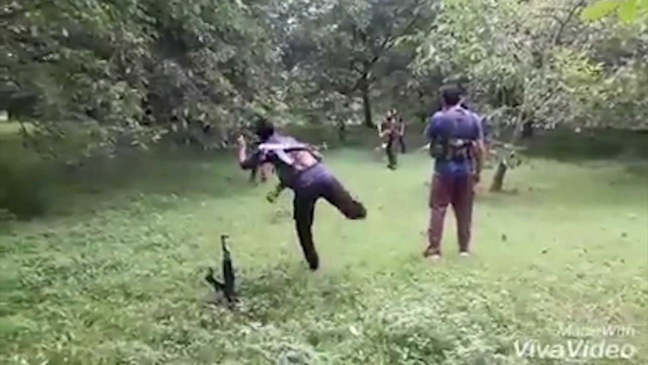 Kashmiri militants play cricket with AK47 as wicket