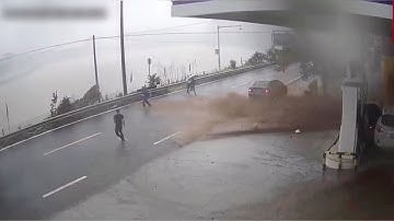 People flee from petrol station in southwestern China as massive landslide approaches