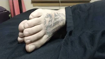 Male Feet Tops on the Bed
