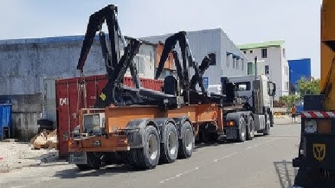 loading container to a side container loading truck trailer