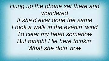 Garth Brooks - What She's Doing Now Lyrics