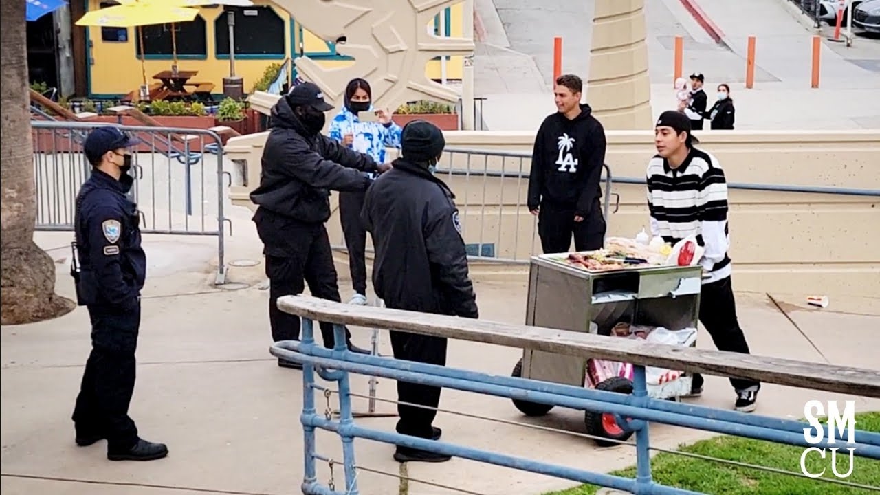 KEEP OFF: Officers Block Unpermitted Vendors at Pier