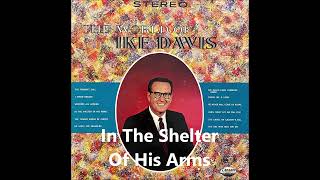 In The Shelter Of His Arms