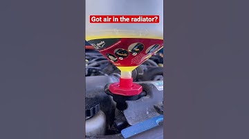 Burping air out of the radiator.