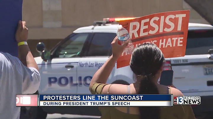 Protesters rally outside the Suncoast as President Trump arrives in Las Vegas