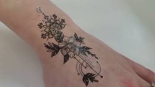 original tattoo on hand. beautiful women&#39;s arm tattoo