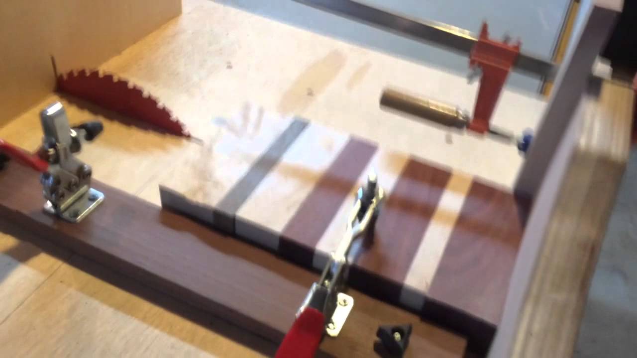 Tablesaw sled, hold down clamps. YouTube