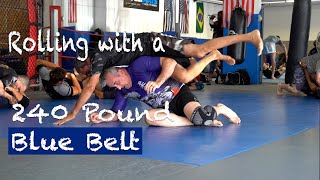 Rolling with a giant Blue Belt