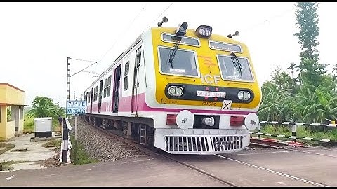 Purple Colour ICF EMU Train Dangerous & Furious Moving Throughout Railgate
