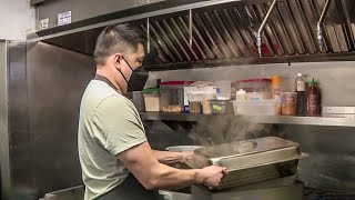 Surge in coronavirus cases hits still-recovering restaurant business