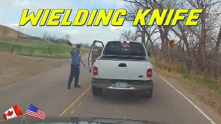 MAN BLOCKS THE ROAD AND THREATENS DRIVER WITH A KNIFE