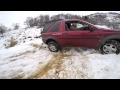 Freelander offroad, snowy, muddy turn