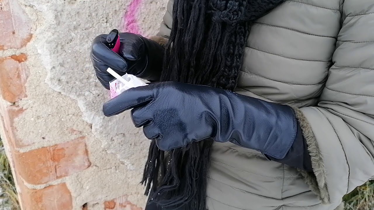 Smoking In Long Leather Gloves
