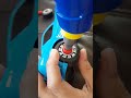 Attaching toy car wheels with electric toy drill