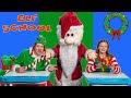 Assistant Helps Jingles the Elf Learn Math in Santa's Elf School