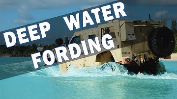 U.S. Marines with CLR-37 conduct deep water fording
