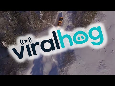Snowplow Clears Deep Heavy Snow After Storm || ViralHog