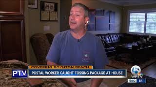 Security camera catches postal worker throwing package