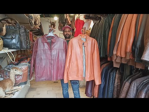 شنط جلد التمساح و جواكت و سجاد جلد طبيعي من اكبر مصنع جلود طبيعي في السيدة زينب اللي بيصدر لاوروبا