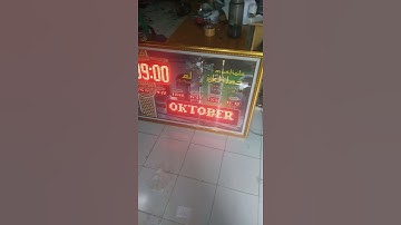 Jam digital JWS, bingkai besar. Running Text dan 7 Segment.