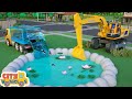 Construction vehicles build a garden pond  for kids