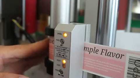 Instructions on how to set and adjust clear label sensor sensitivity