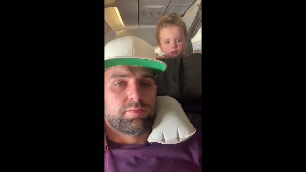 Crying Child Peeks Over Plane Seat ViralHog