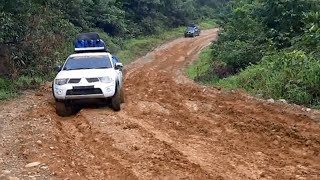 Toyota Hilux and Mitsubishi Triton Slippery Mud Hill Climb  Double Cab Truck In Mud Route