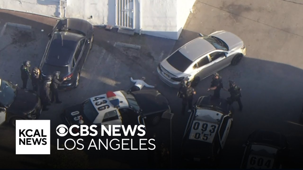 Barricaded suspect surrenders to police after hours-long standoff - YouTube