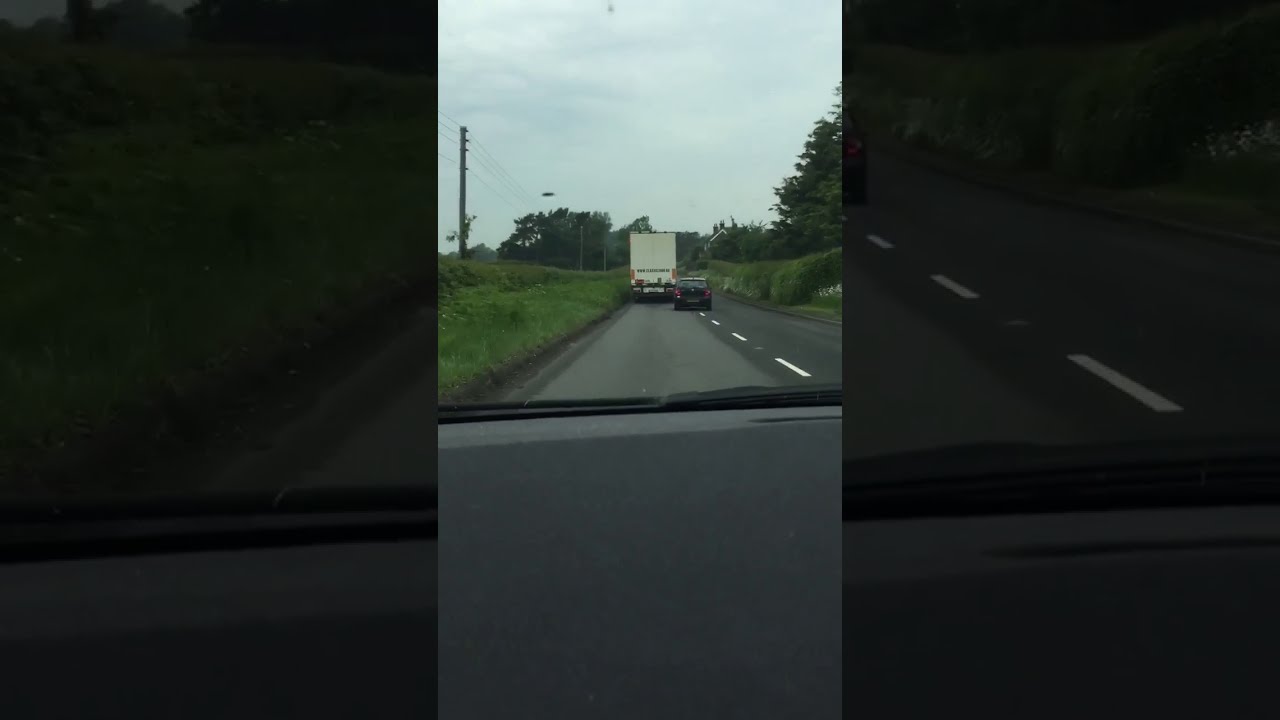 Car Tries To Overtake Lorry And Narrowly Misses Getting Hit By Oncoming CONTENTbible