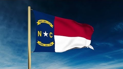 4K north carolina flag slider style. Waving in the win with cloud background animation Stock video