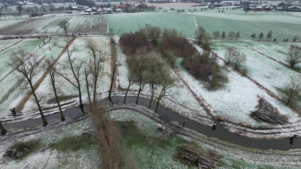 Oude kalevallei merendree Belgium  with a thin layer of snow filmed with DJI NEO2